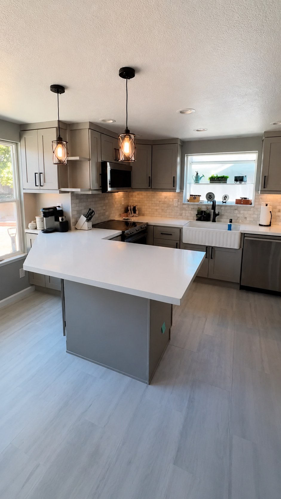 Kitchen remodel with custom cabinetry and white island